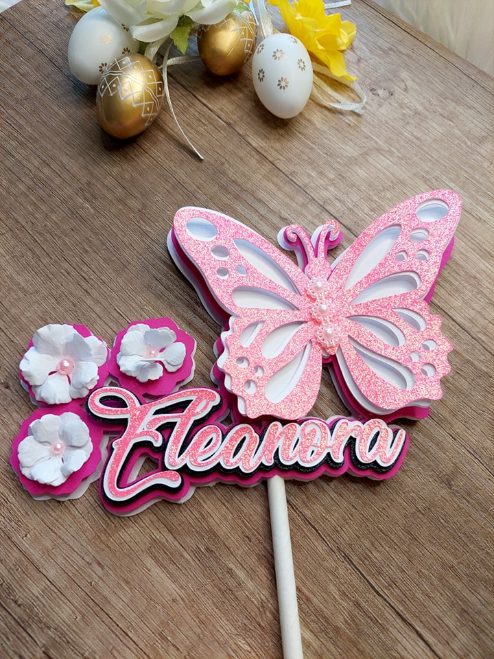 Koogitopper sädeleva liblikaga.